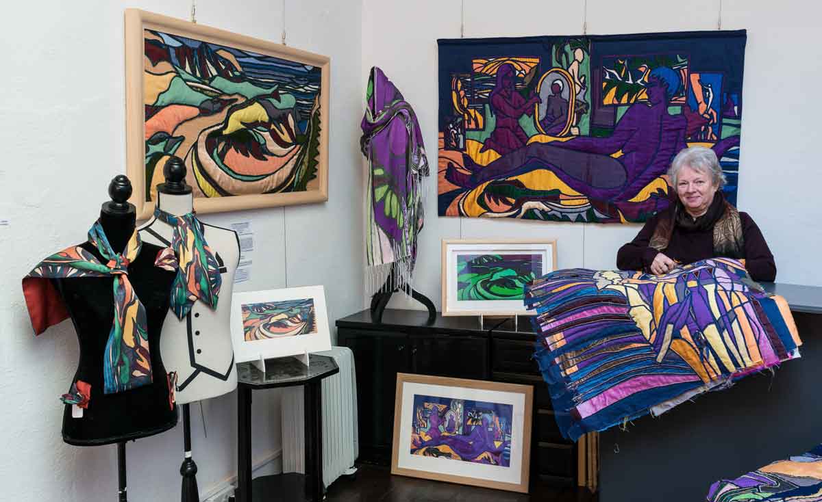 Cynth Weyman in the Gallery with her work